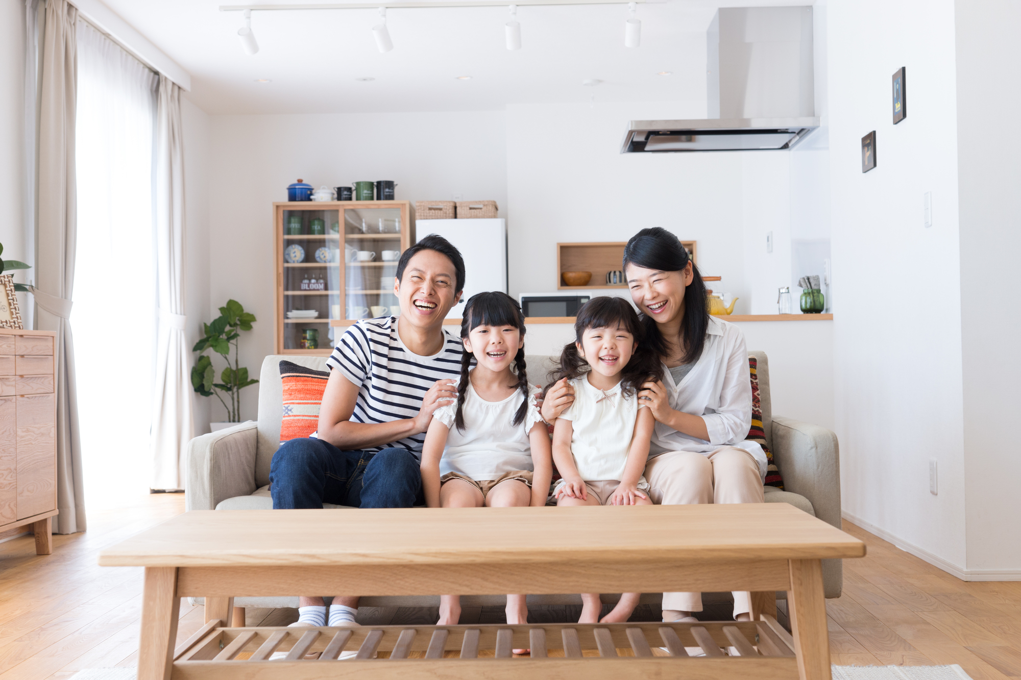 松江市の自由設計注文住宅に住む家族